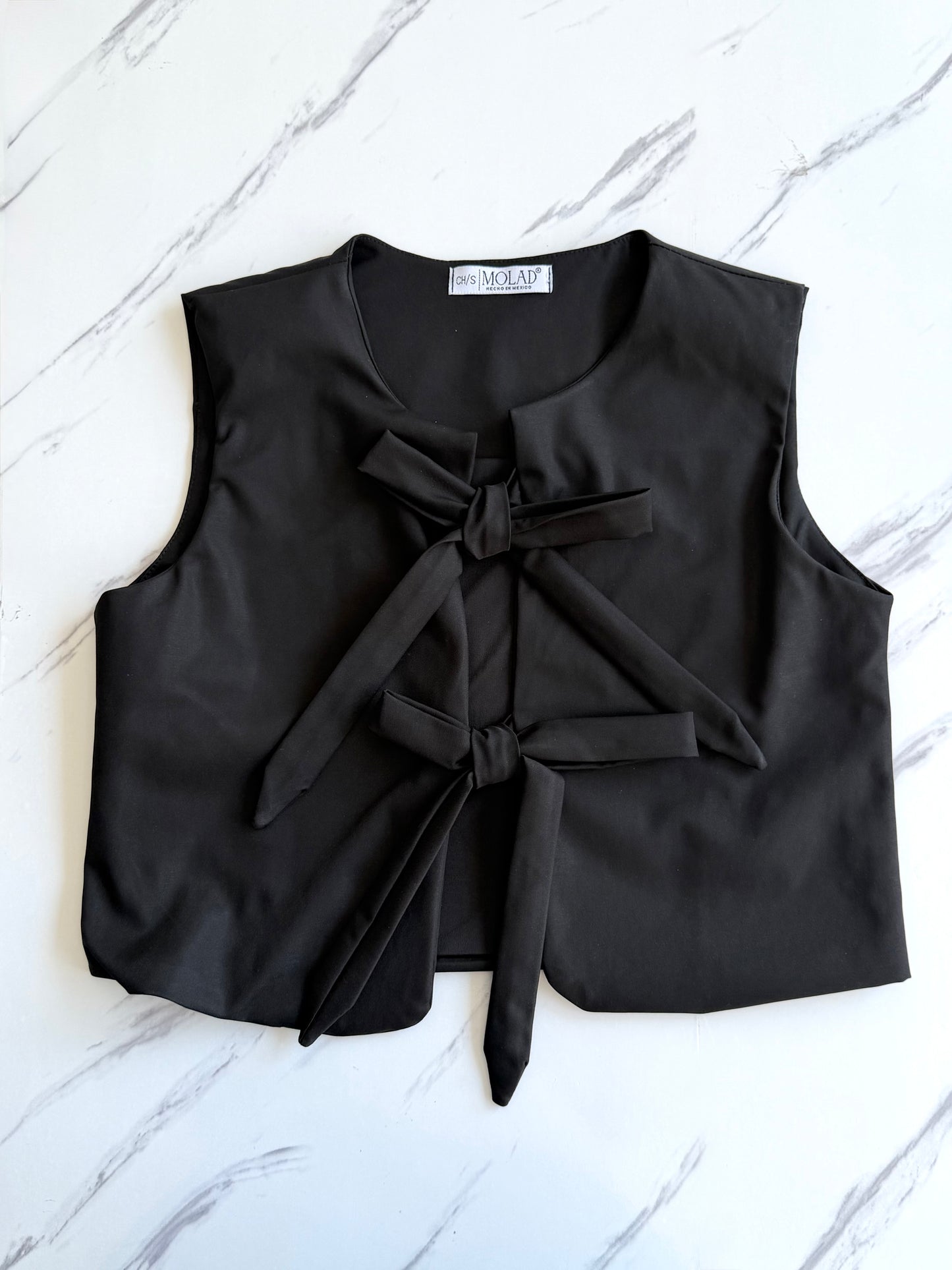 Blusa Moños
