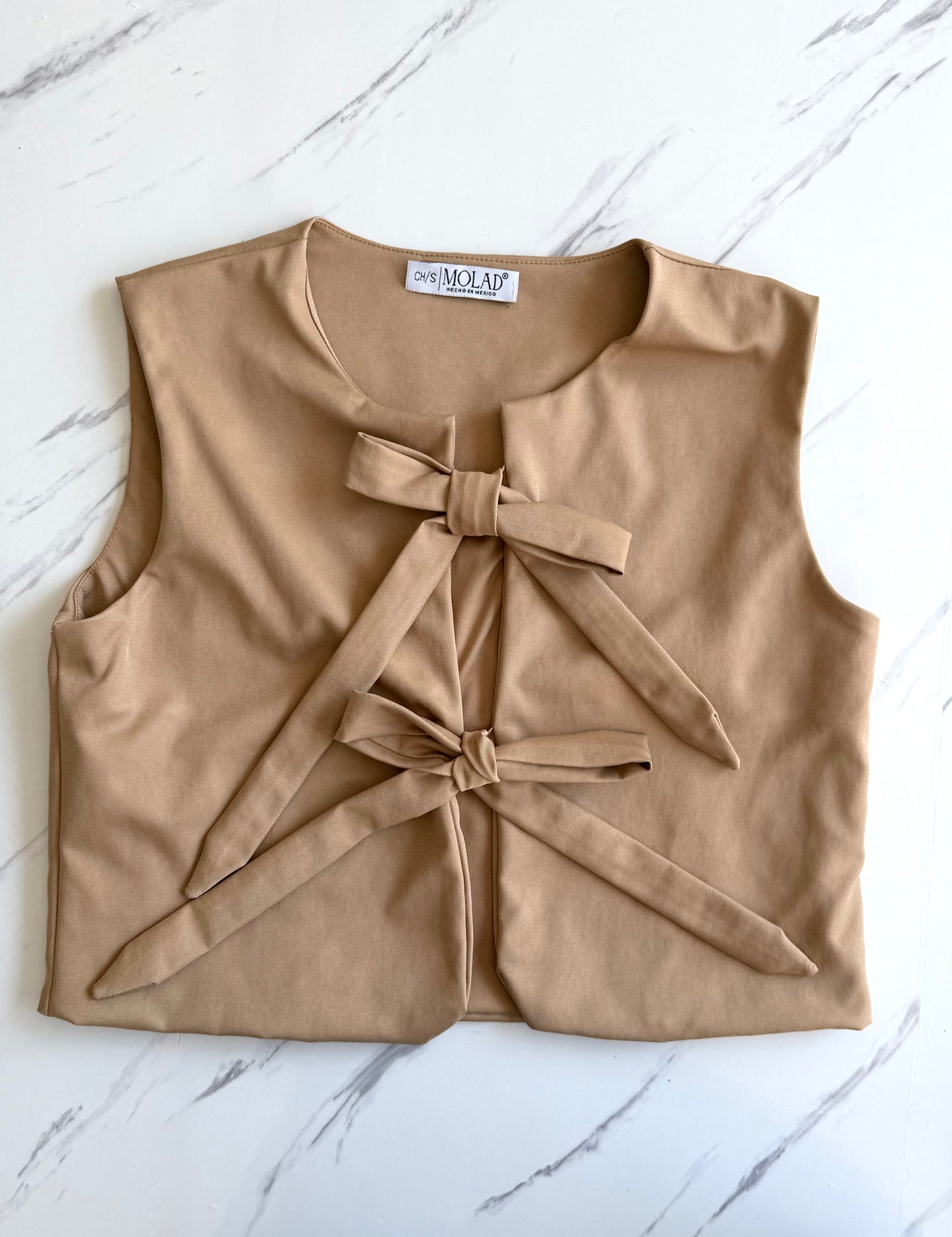 Blusa Moños