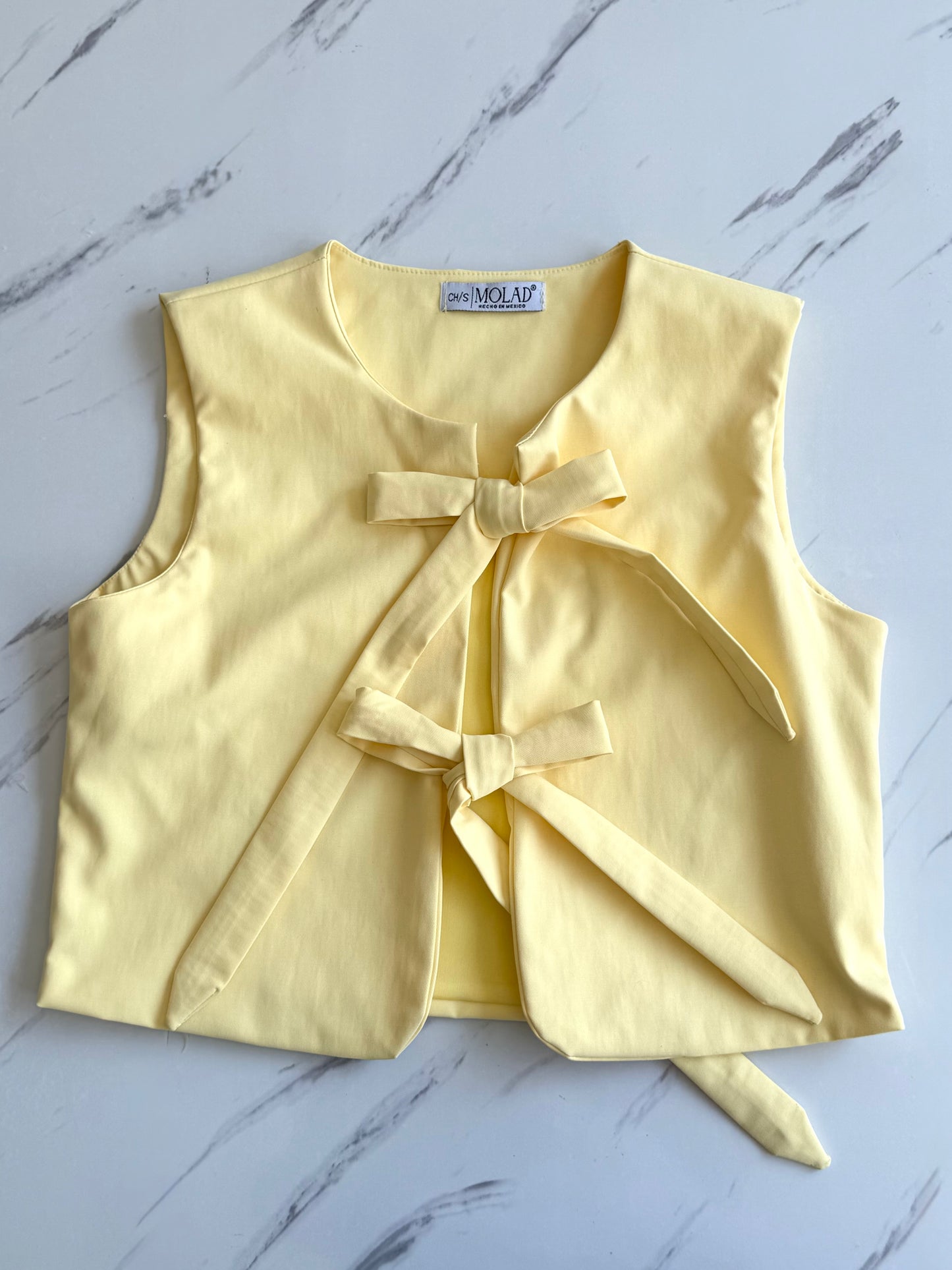 Blusa Moños
