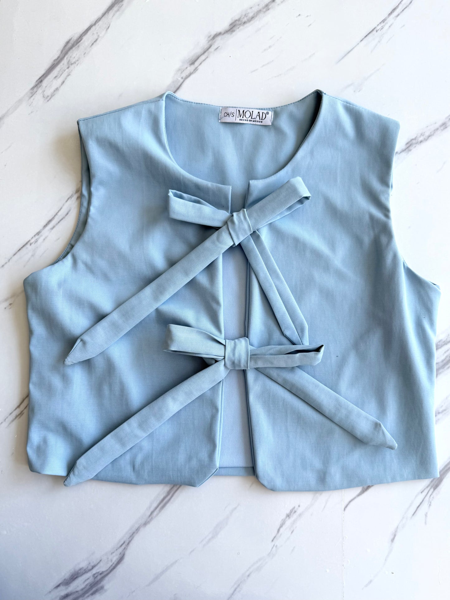 Blusa Moños